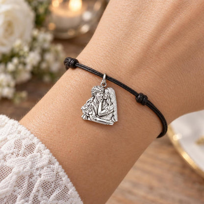 Eternal Wedding Portrait Charm Bracelet – Personalized Couple Gift – worn on the wrist on a black cord bracelet