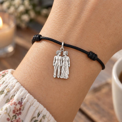 Everlasting Hand in Hand Charm Bracelet – Personalized Couple Gift – worn on the wrist on a black cord bracelet