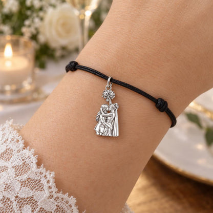 Everlasting Wedding Kiss Charm Bracelet – Personalized Couple Gift – worn on the wrist on a black cord bracelet