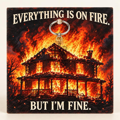 Everything Is On Fire Charm Keychain – silver, on its message card