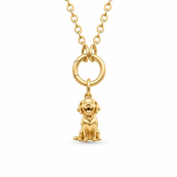 Gold dog companion charm necklace featuring a smiling puppy pendant hanging from a circular clasp and chain.
