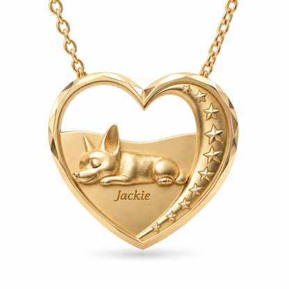 Gold heart pendant featuring a sleeping dog silhouette and engraved name on a delicate chain necklace.