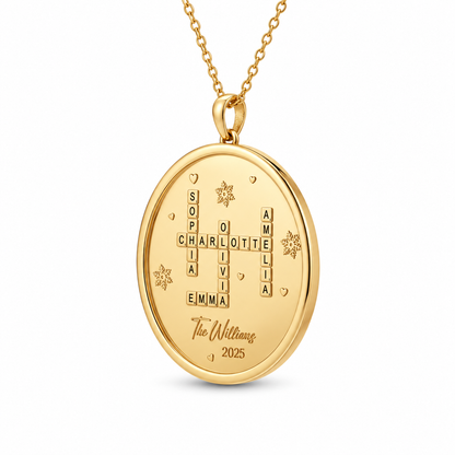 Oval gold vermeil necklace engraved with a custom family crossword and the year twenty twenty five