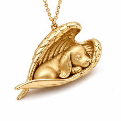 Close up view of the gold sleeping angel pet necklace showing intricate feather textures on wings.