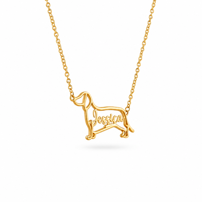 Close up of a gold personalized dog breed necklace showing the intricate fine line wire work.