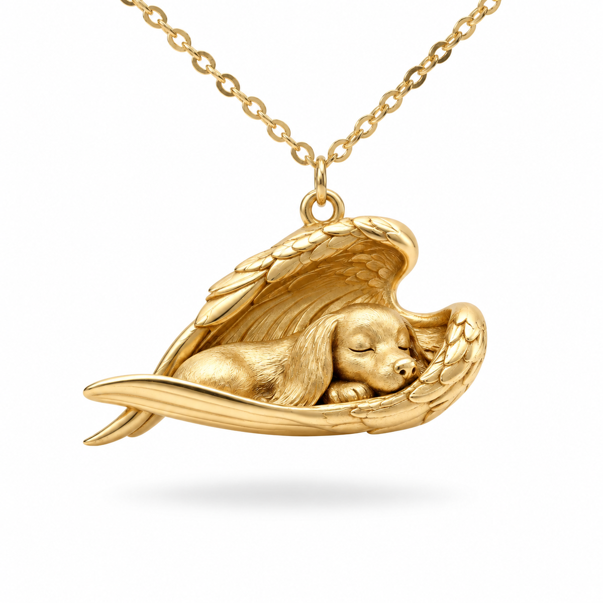 Gold vermeil sleeping pet memorial necklace pendant featuring a dog resting inside detailed angel wings.