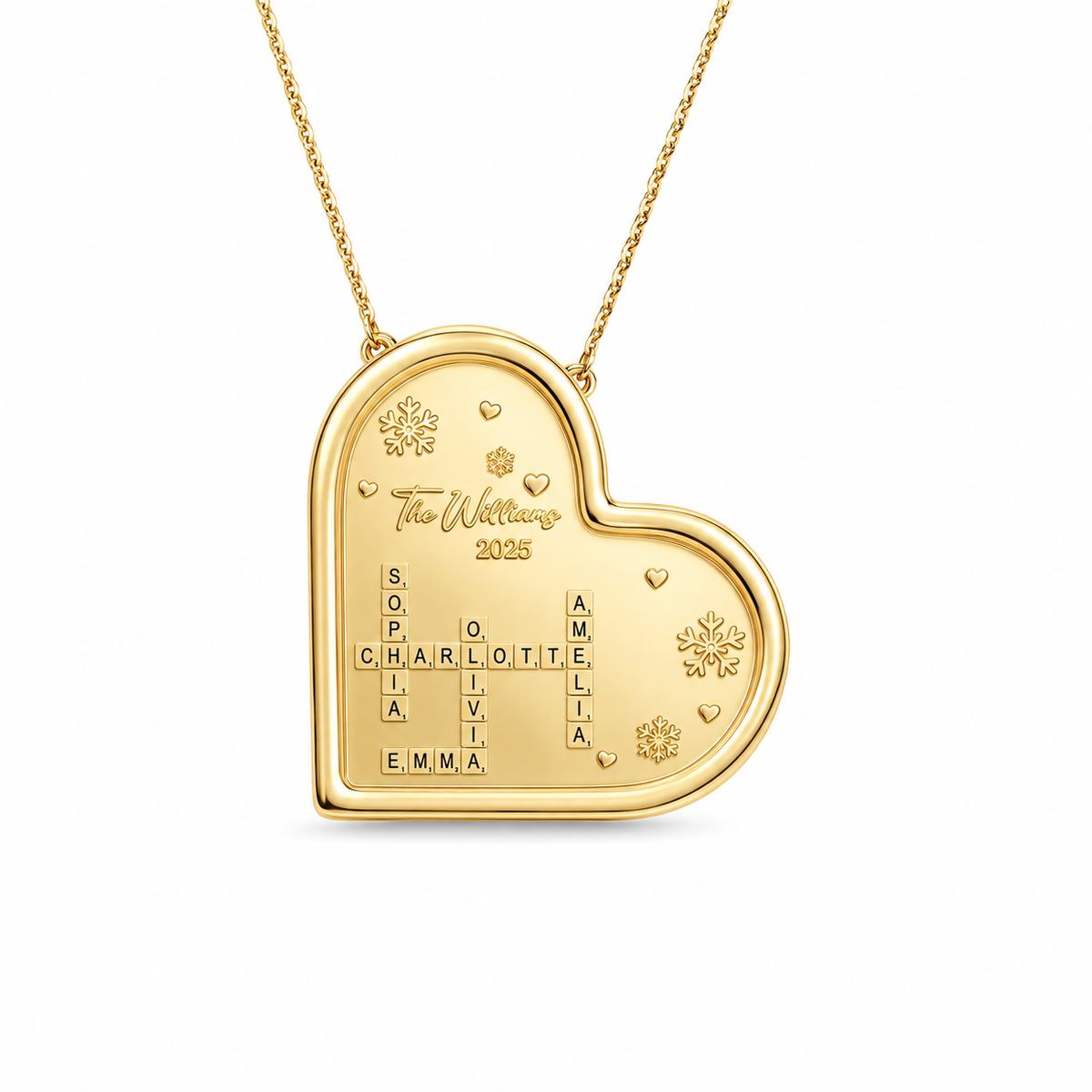 Gold heart shaped pendant with family crossword names and snowflake engravings on a thin cable chain