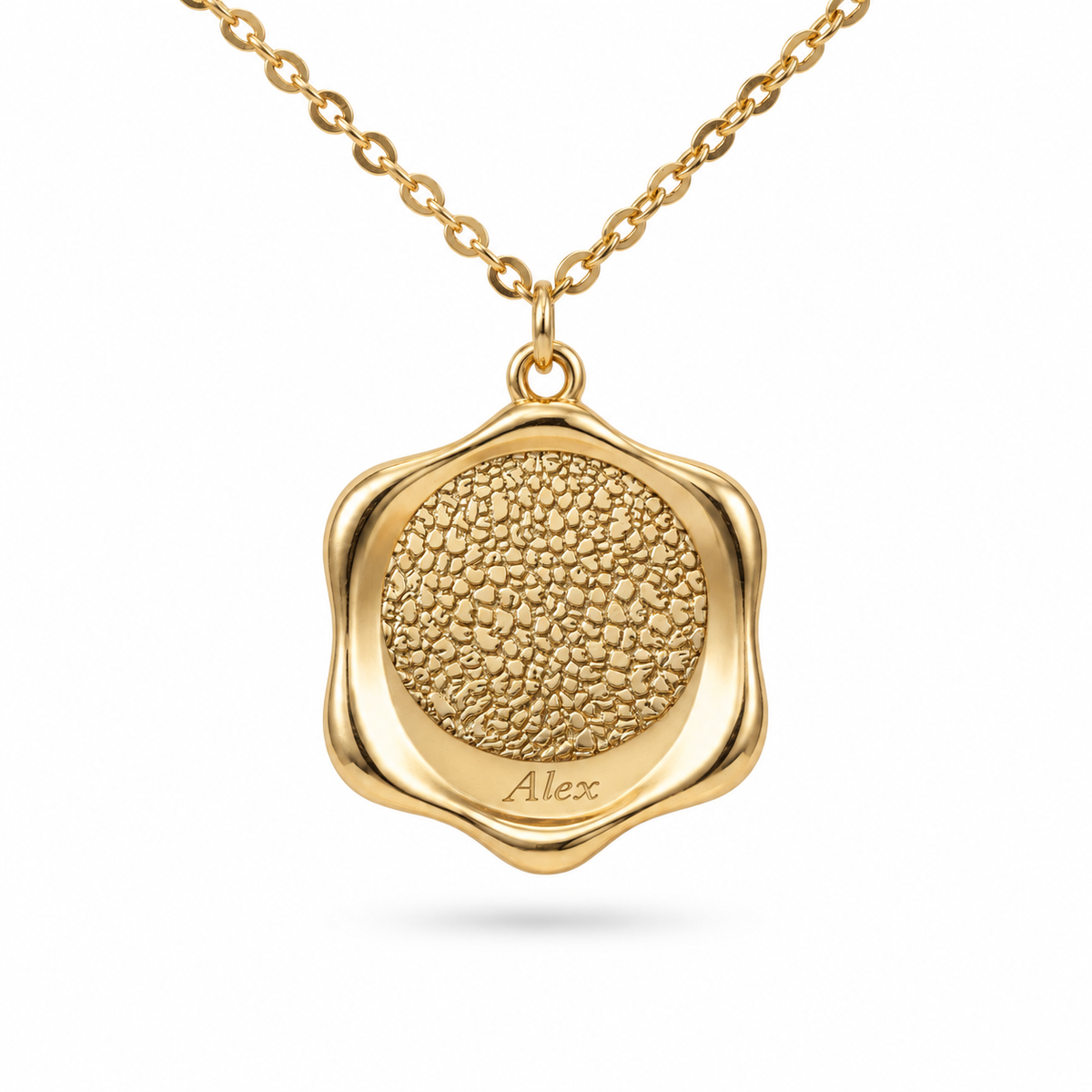 Gold scalloped edge pendant featuring a detailed pet nose engraving and personalized name at the bottom.