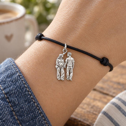 Expecting Hand in Hand Charm Bracelet – Personalized Couple Gift – worn on the wrist on a black cord bracelet