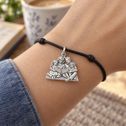 Family Storytime Charm Bracelet – Personalized Mom Gift – worn on the wrist on a black cord bracelet