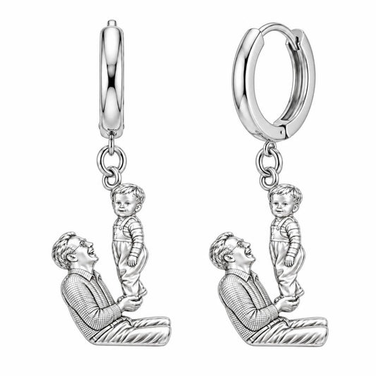 Father and Child Lifted High Huggie Charm Earrings – silver, front view