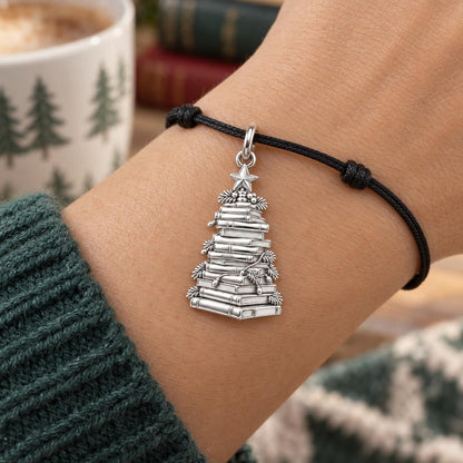 Festive Book Stack Tree Charm Bracelet – Personalized Book Lover Gift – worn on the wrist on a black cord bracelet