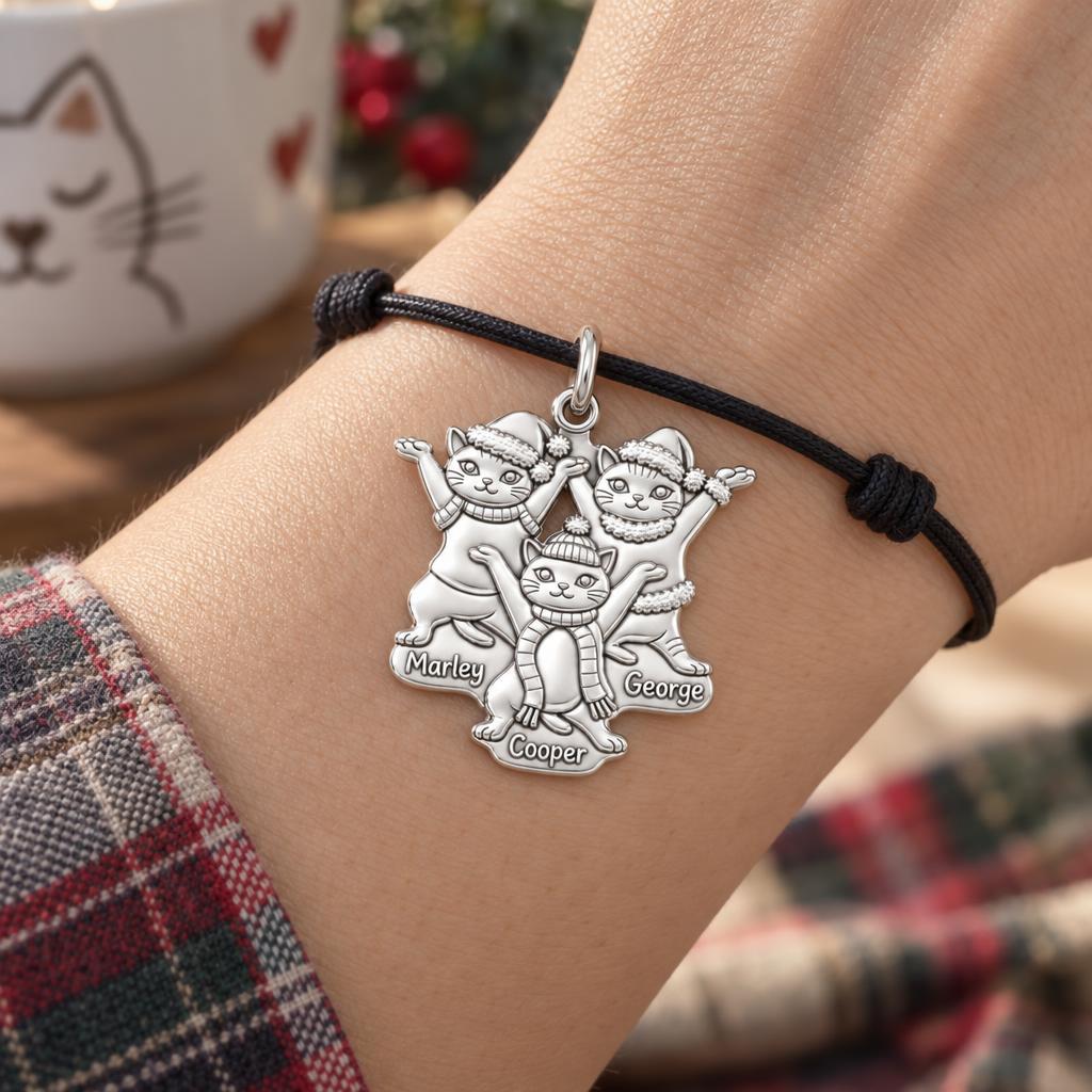 Festive Feline Trio Charm Bracelet – Personalized Cat Mom Gift – worn on the wrist on a black cord bracelet