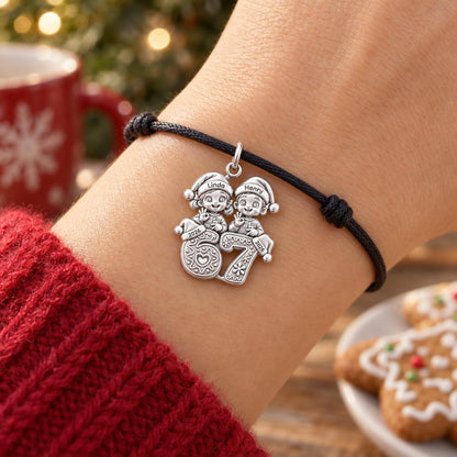 Festive Gingerbread Milestone Charm Bracelet – Personalized Mom Gift – worn on the wrist on a black cord bracelet