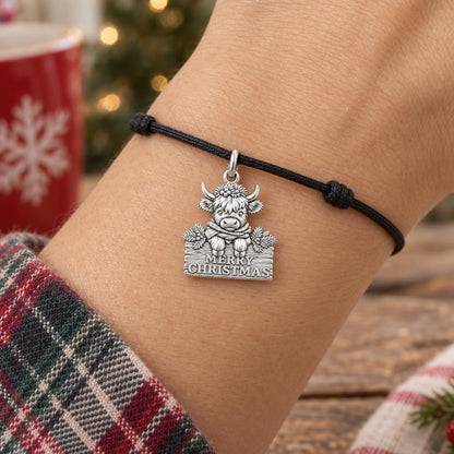 Festive Highland Cow Charm Bracelet – Personalized Mom Gift – worn on the wrist on a black cord bracelet