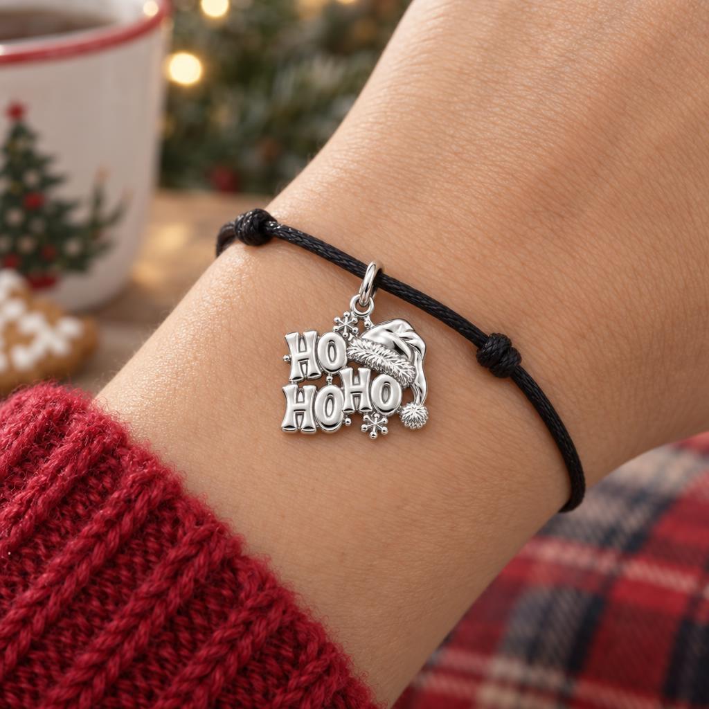 Festive Ho Ho Ho Charm Bracelet – Personalized Mom Gift – worn on the wrist on a black cord bracelet