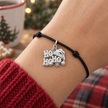 Festive Ho Ho Ho Charm Bracelet – Personalized Mom Gift – worn on the wrist on a black cord bracelet