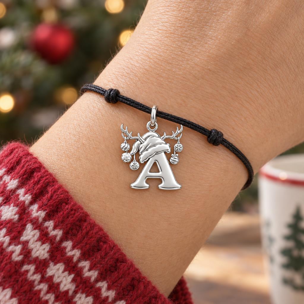 Festive Reindeer Initial Charm Bracelet – Personalized Mom Gift – worn on the wrist on a black cord bracelet