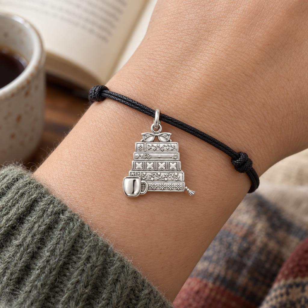 Fireside Reading Nook Charm Bracelet – Personalized Book Mom Gift – worn on the wrist on a black cord bracelet