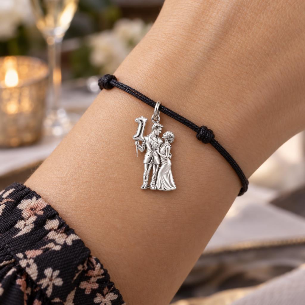 First Anniversary Celebration Charm Bracelet – Personalized Couple – worn on the wrist on a black cord bracelet