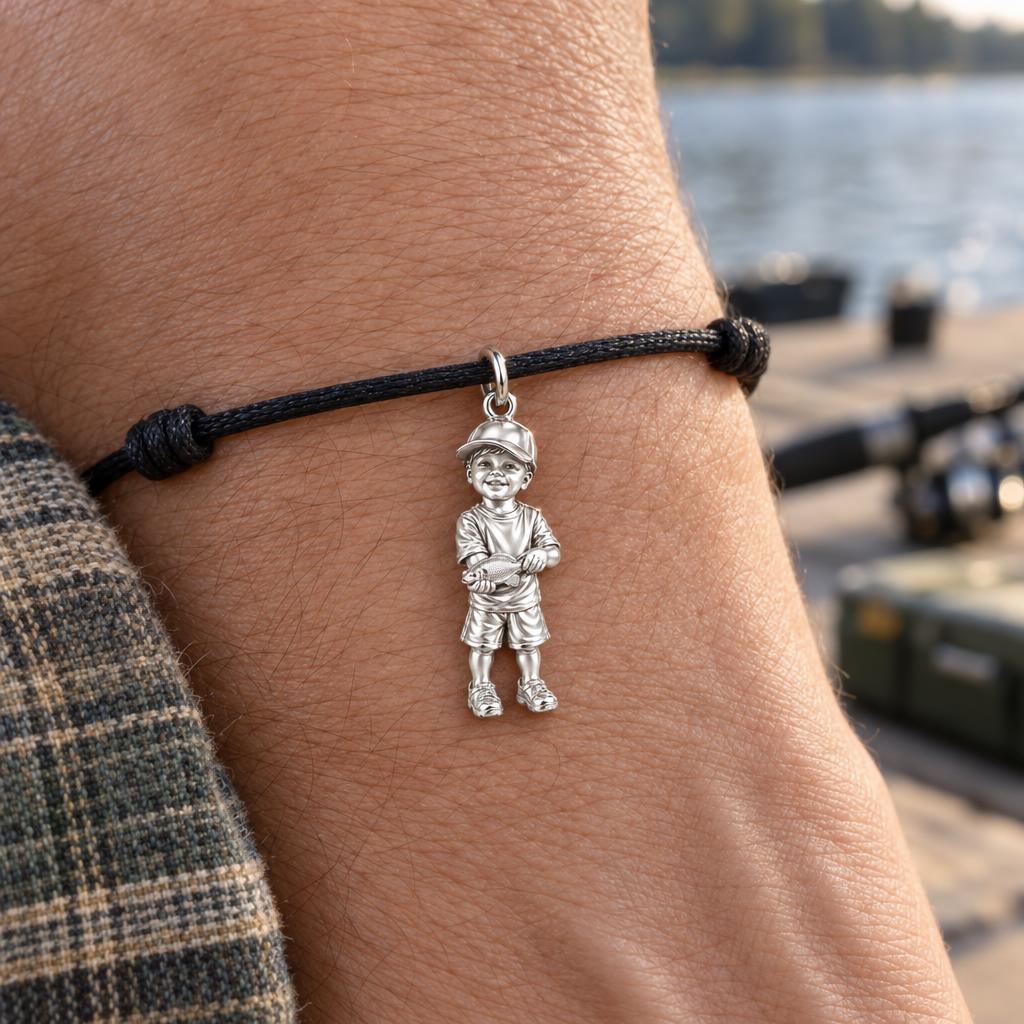First Big Catch Charm Bracelet – Personalized Dad Gift – worn on the wrist on a black cord bracelet