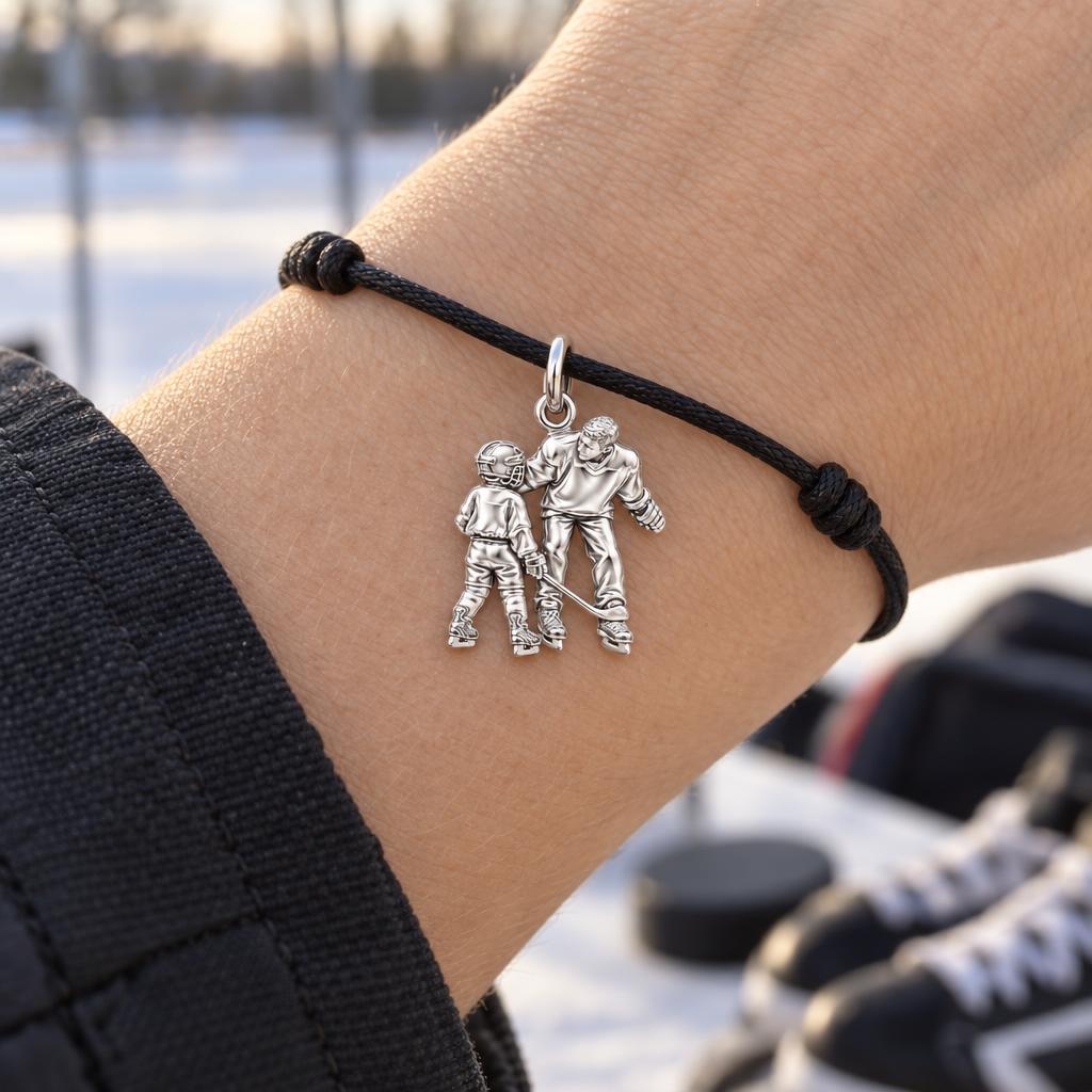 First Lesson on Ice Charm Bracelet – Personalized Dad Gift – worn on the wrist on a black cord bracelet