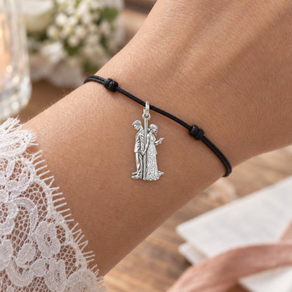 First Look Vows Charm Bracelet – Personalized Couple Gift – worn on the wrist on a black cord bracelet