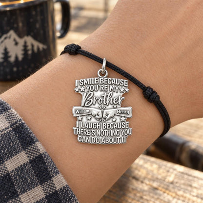 Fist Bump Bond Charm Bracelet – Personalized Brother Gift – worn on the wrist on a black cord bracelet