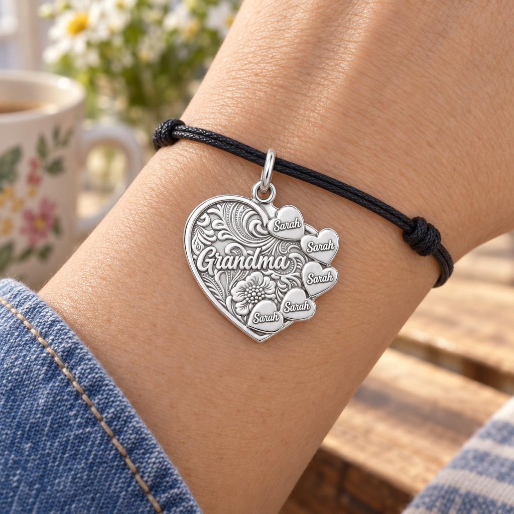 Floral Heart Garden Charm Bracelet – Personalized Grandma Gift – worn on the wrist on a black cord bracelet