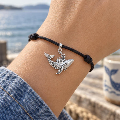 Floral Song Humpback Whale Charm Bracelet – Personalized Mom Gift – worn on the wrist on a black cord bracelet