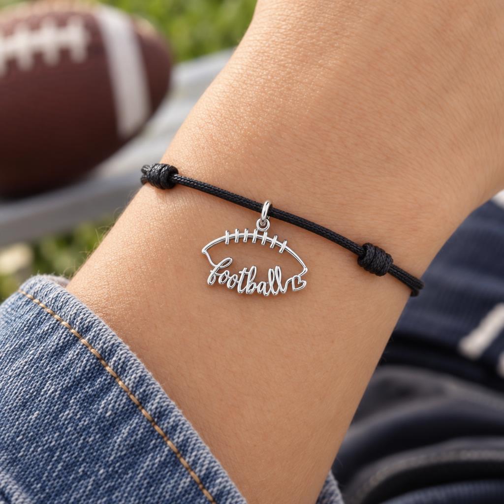 Football Heart Outline Charm Bracelet – Personalized Mom Gift – worn on the wrist on a black cord bracelet
