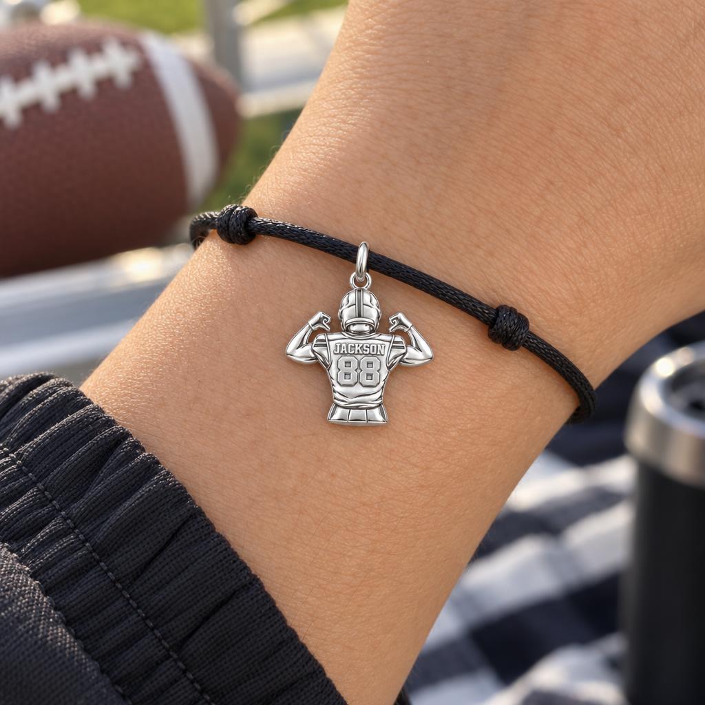 Football Jersey Flex Charm Bracelet – Personalized Mom Gift – worn on the wrist on a black cord bracelet