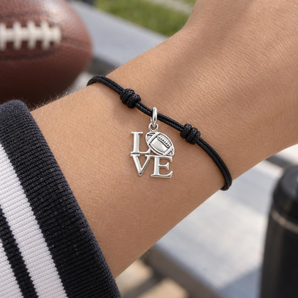 Football Love Charm Bracelet – Personalized Sports Mom Gift – worn on the wrist on a black cord bracelet