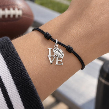 Football Love Charm Bracelet – Personalized Sports Mom Gift – worn on the wrist on a black cord bracelet