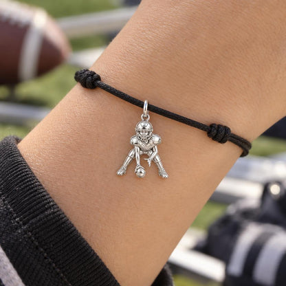 Football Player Charm Bracelet – Personalized Sports Mom Gift – worn on the wrist on a black cord bracelet