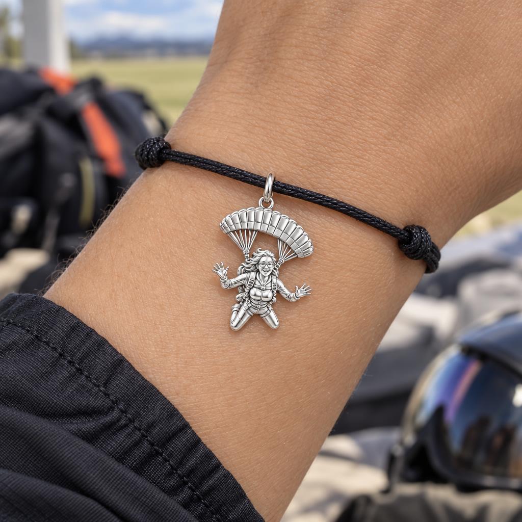 Free Falling Skydiver Charm Bracelet – Personalized Adventurer Gift – worn on the wrist on a black cord bracelet