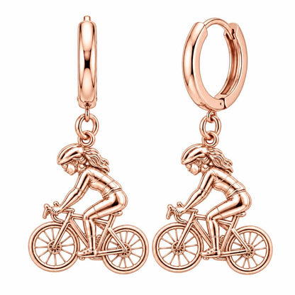 Free Spirit Cyclist Huggie Charm Earrings – rose gold, front view