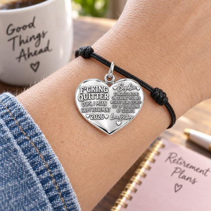 Funny Retirement Heart Charm Bracelet – Personalized Coworker Gift – worn on the wrist on a black cord bracelet