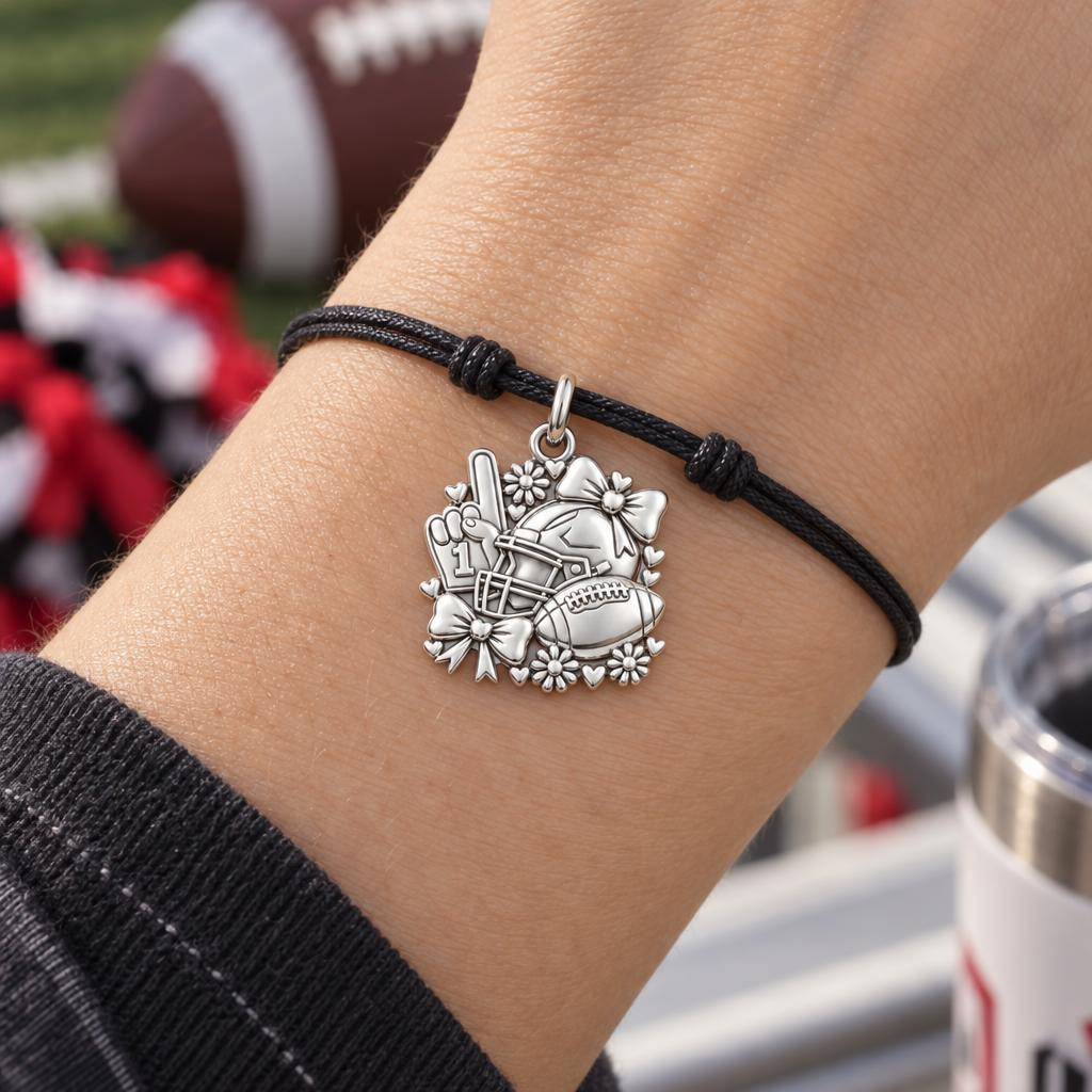 Game Day Bows and Hearts Charm Bracelet – Personalized Mom Gift – worn on the wrist on a black cord bracelet