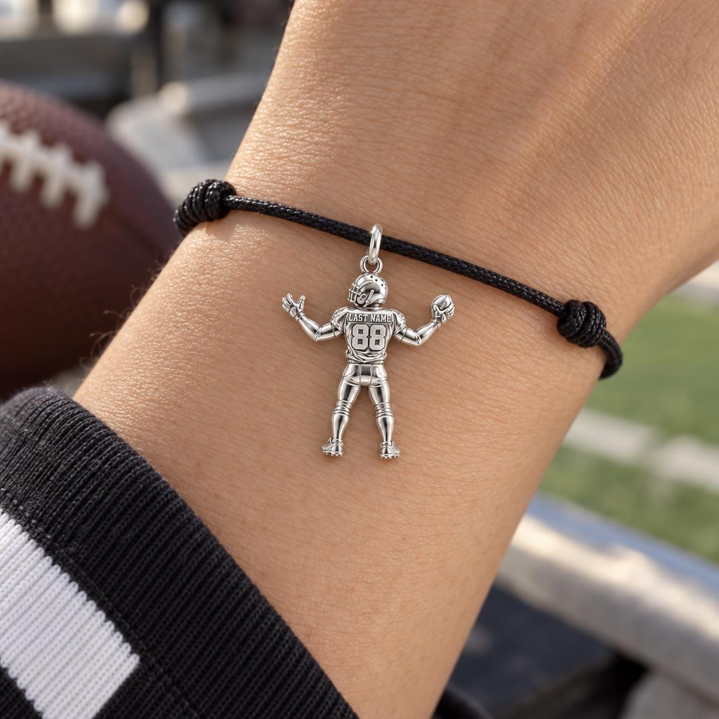 Game Day Gridiron Hero Charm Bracelet – Personalized Mom Gift – worn on the wrist on a black cord bracelet
