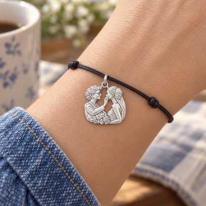 Generational Love Portrait Charm Bracelet – Personalized Mom Gift – worn on the wrist on a black cord bracelet