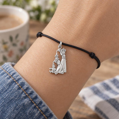 Generational Nurture Charm Bracelet – Personalized Mom Gift – worn on the wrist on a black cord bracelet