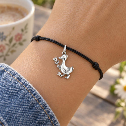Gentle Duckling with Rose Charm Bracelet – Personalized Mom Gift – worn on the wrist on a black cord bracelet