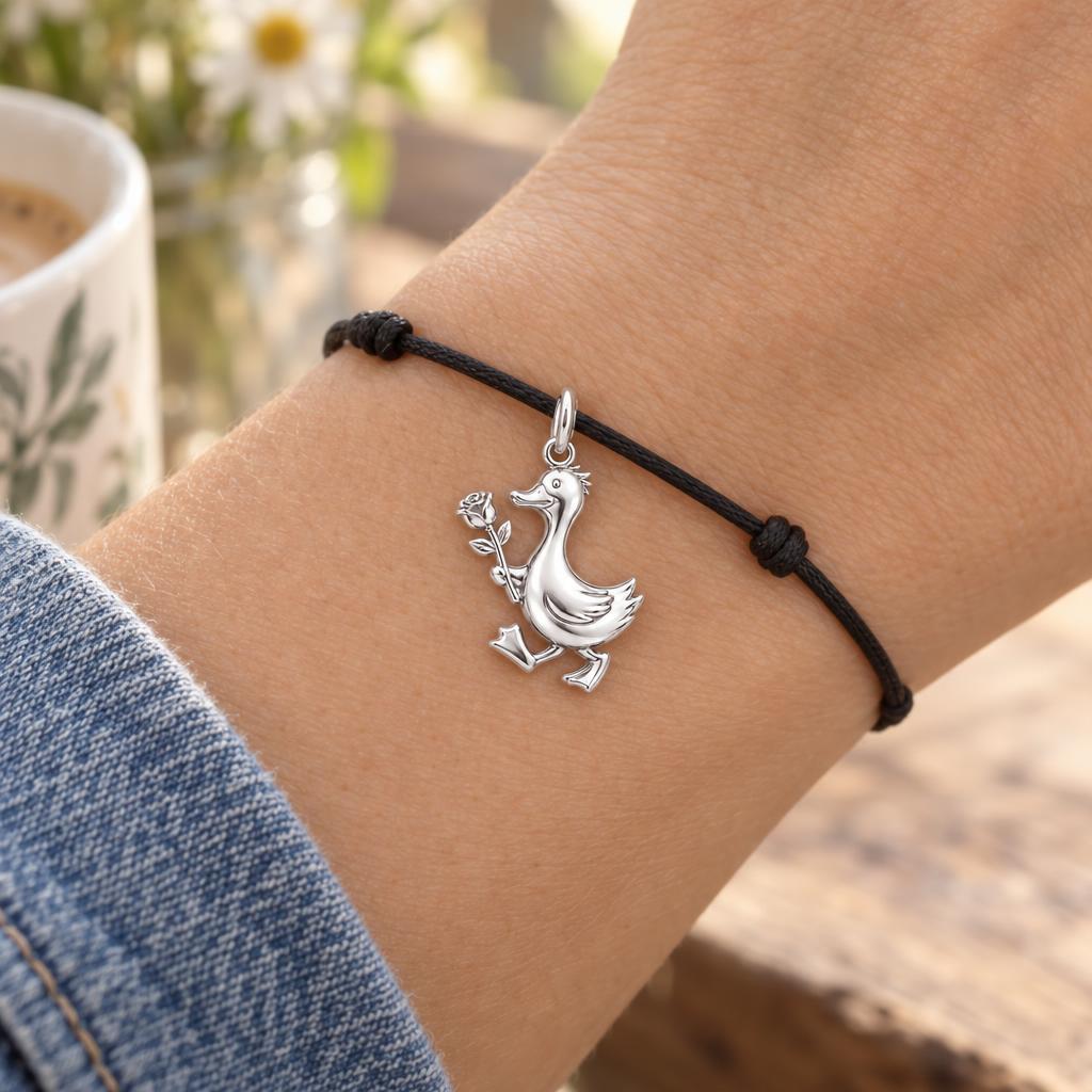 Gentle Duckling with Rose Charm Bracelet – Personalized Mom Gift – worn on the wrist on a black cord bracelet