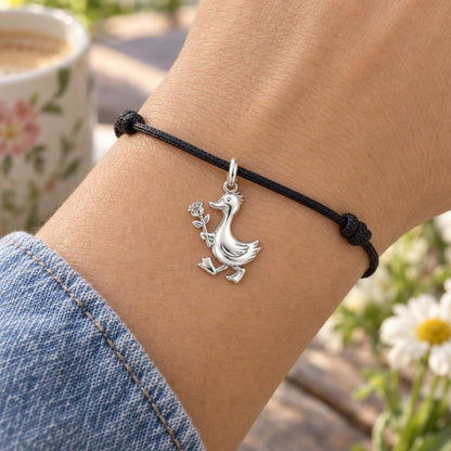Gentle Duckling with Rose Charm Bracelet – Personalized Mom Gift – worn on the wrist on a black cord bracelet