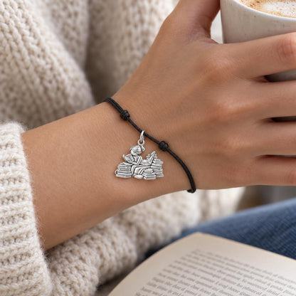 Girl Who Loves Books Charm and Polyester Cord Bracelet Set – worn on the wrist on a black cord bracelet