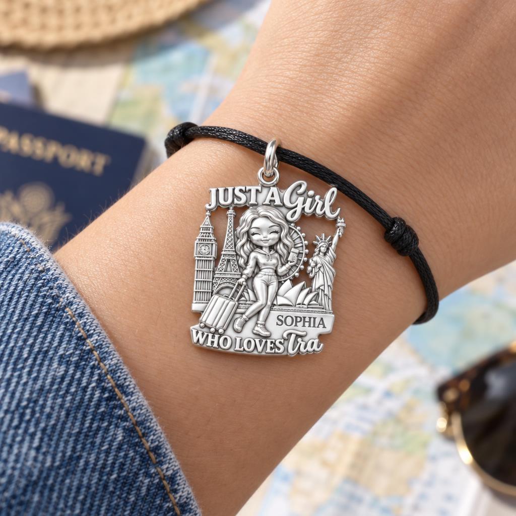 Girl Who Loves Traveling Charm Bracelet – Personalized Traveler Gift – worn on the wrist on a black cord bracelet