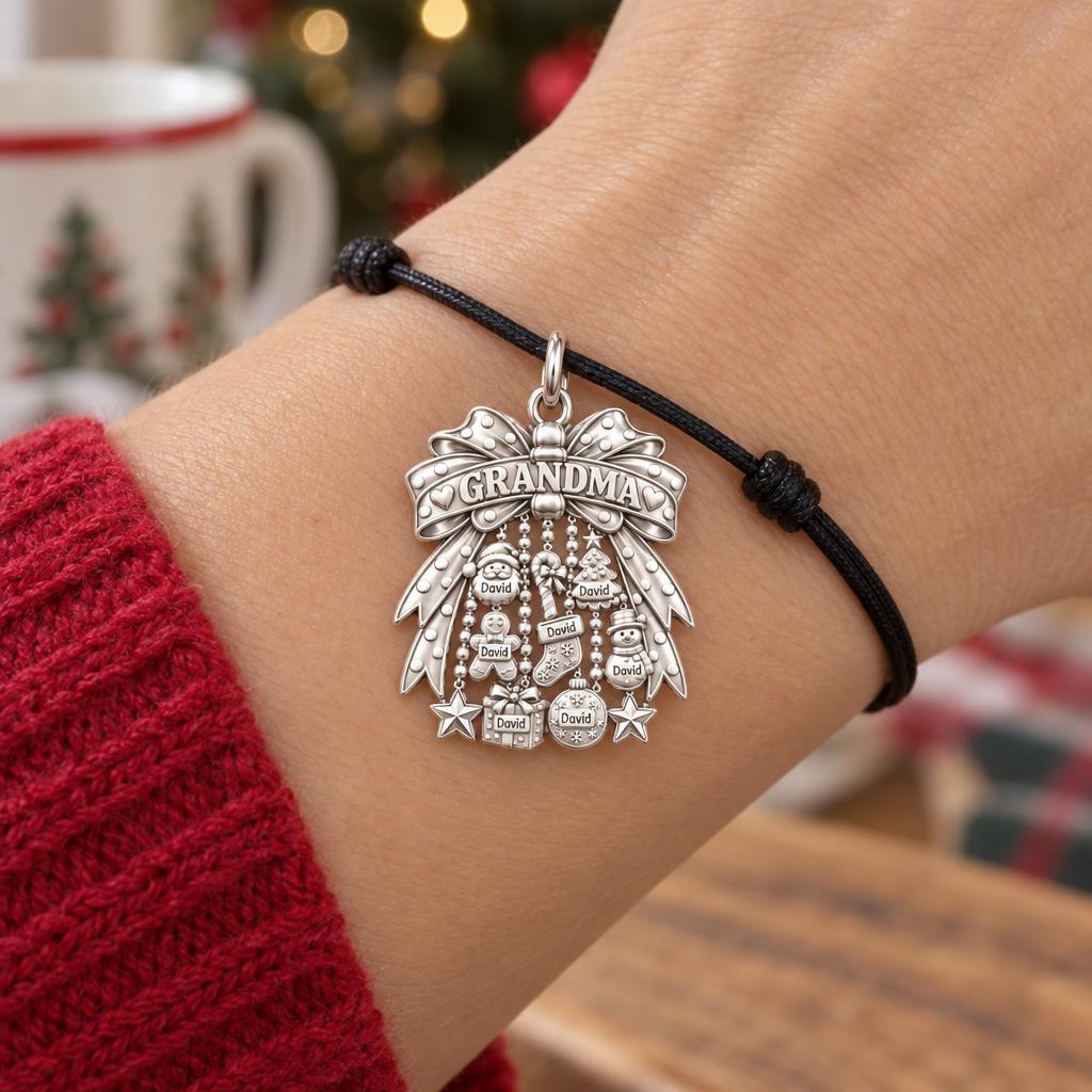 Grandma's Holiday Bow Charm Bracelet – Personalized Nana Gift – worn on the wrist on a black cord bracelet