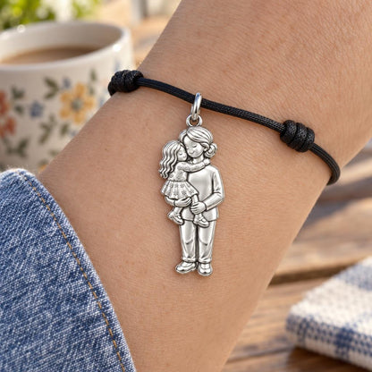 Grandma's Warm Embrace Charm Bracelet – Personalized Nana Gift – worn on the wrist on a black cord bracelet