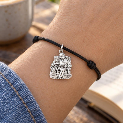 Grandpa's Storytime Charm Bracelet – Personalized Grandpa Gift – worn on the wrist on a black cord bracelet